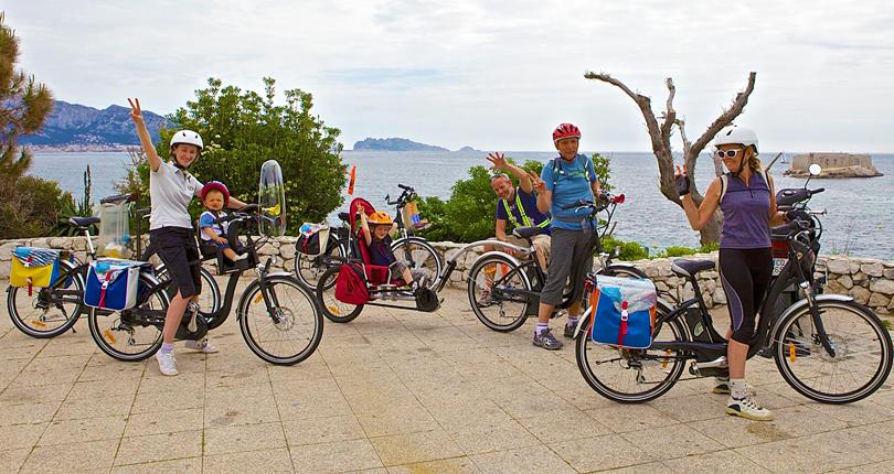 Happy people on electric bikes